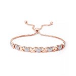 Pulsera con eslabones en X y corazón con detalles de diamantes