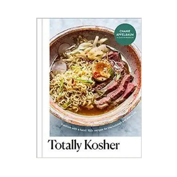 Ocupado en la tradición totalmente kosher de Brooklyn con un libro de cocina giratorio