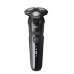 Afeitadora eléctrica Norelco Wet &amp; Dry con recortador emergente