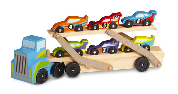 Melissa &amp; Doug Mega transportador de autos de carreras