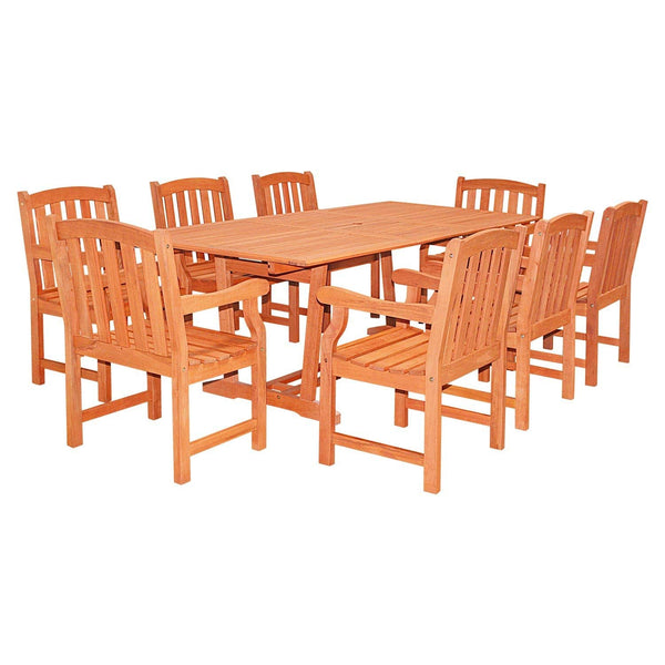 Mesa extensible rectangular con 8 sillas.
